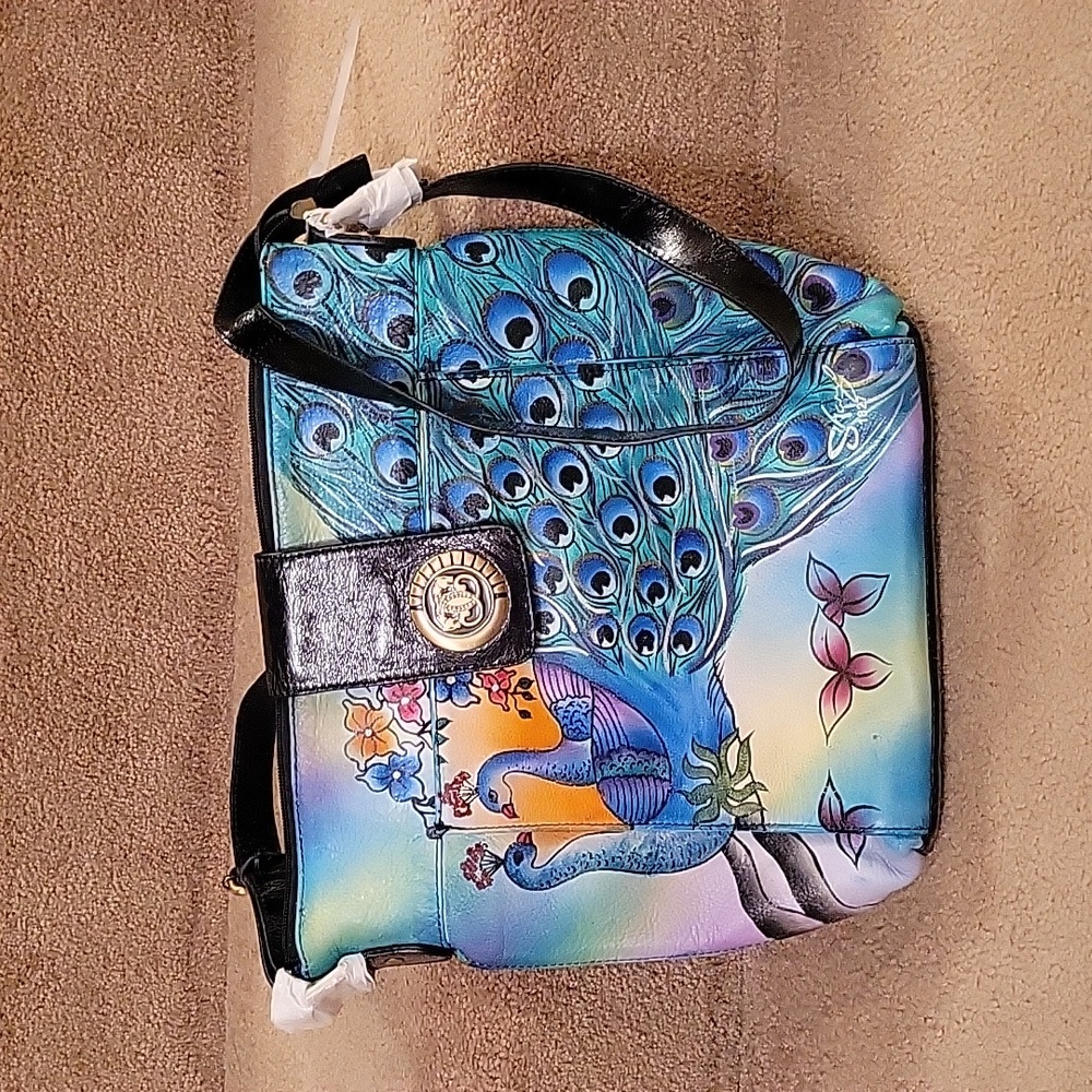 Sharif leather peacock bag